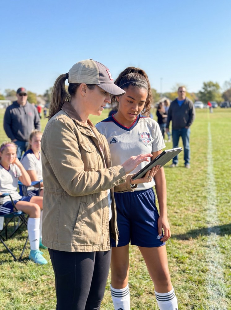 Youth club coach on the sideline